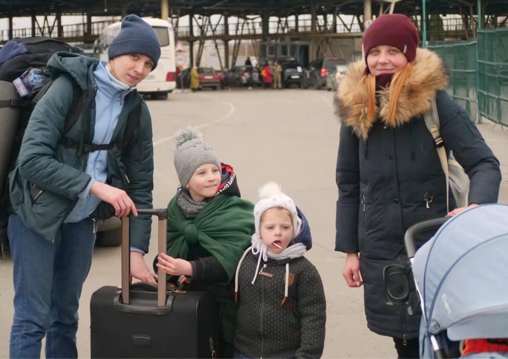 family in warm winter clothes